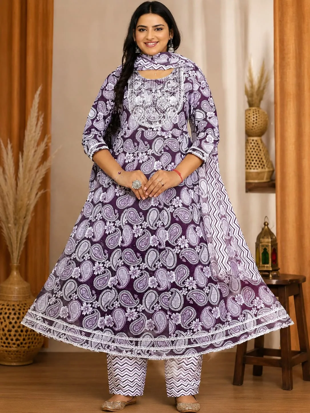 Purple paisley-print anarkali with embroidered yoke, chevron pants and matching dupatta
